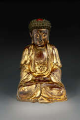 A SMALL GILT-LACQUERED CARVED WOOD FIGURE OF BUDDHA