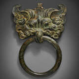 A BRONZE TAOTIE MASK FITTING WITH RING HANDLE - photo 1