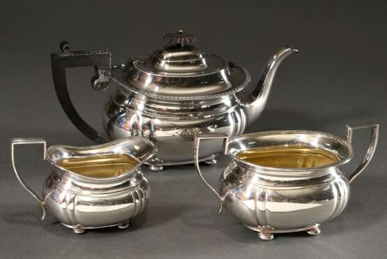 3 Teile versilbertes Teeset: Kanne (H. 16cm), Milchkännchen (H. 9cm), Zuckerschale (H. 10cm), Schottland Anfang 20.Jh. - Foto 2