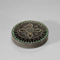 A ROUND SILVER BOX AND LID