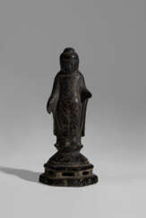 A GILT-BRONZE SCULPTURE OF A STANDING BUDDHA