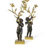 A PAIR OF NAPOLEON III ORMOLU AND PATINATED BRONZE TWO-LIGHT CANDELABRA - фото 1