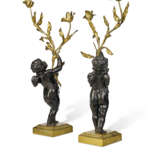 A PAIR OF NAPOLEON III ORMOLU AND PATINATED BRONZE TWO-LIGHT CANDELABRA - photo 2