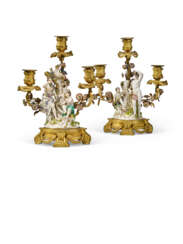A PAIR OF LOUIS XVI ORMOLU-MOUNTED MEISSEN AND FRENCH PORCELAIN THREE-LIGHT CANDELABRA