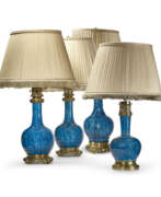 Lampe de chevet. THREE GILT-BRONZE MOUNTED THEODORE DECK FAIENCE 'PERSIAN BLUE' BOTTLE VASES, MOUNTED AS LAMPS