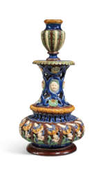 A FRENCH PALISSY-STYLE EARTHENWARE PIERCED CANDLESTICK