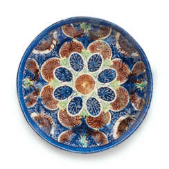 A FRENCH POST-PALISSY EARTHENWARE SHALLOW BOWL