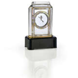 A RARE ART DECO ROCK CRYSTAL, DIAMOND, MOTHER-OF-PEARL AND BLACK ONYX `MODEL A` MYSTERY CLOCK - Foto 1