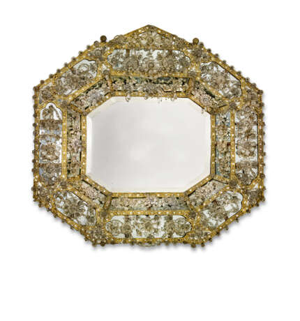AN ITALIAN ROCK CRYSTAL AND EMBOSSED GILT-COPPER MIRROR - photo 1