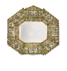 AN ITALIAN ROCK CRYSTAL AND EMBOSSED GILT-COPPER MIRROR