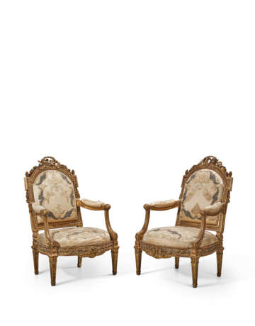 A PAIR OF LATE LOUIS XV GILT WALNUT AND WHITE-PAINTED FAUTEUILS - photo 1