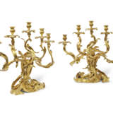 A PAIR OF LOUIS XV ORMOLU FIVE-BRANCH CANDELABRA - photo 1