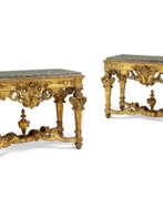 Granit. A PAIR OF ITALIAN GILTWOOD CONSOLE TABLES