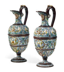 TWO FRENCH POST-PALISSY EARTHENWARE EWERS