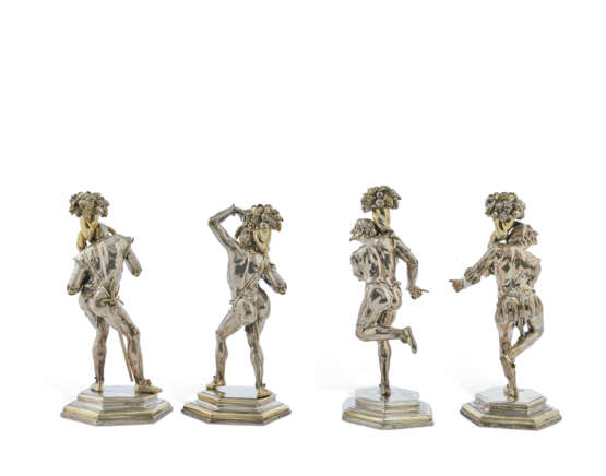A SET OF FOUR CONTINENTAL PARCEL-GILT SILVER FIGURAL CANDLESTICKS - фото 2