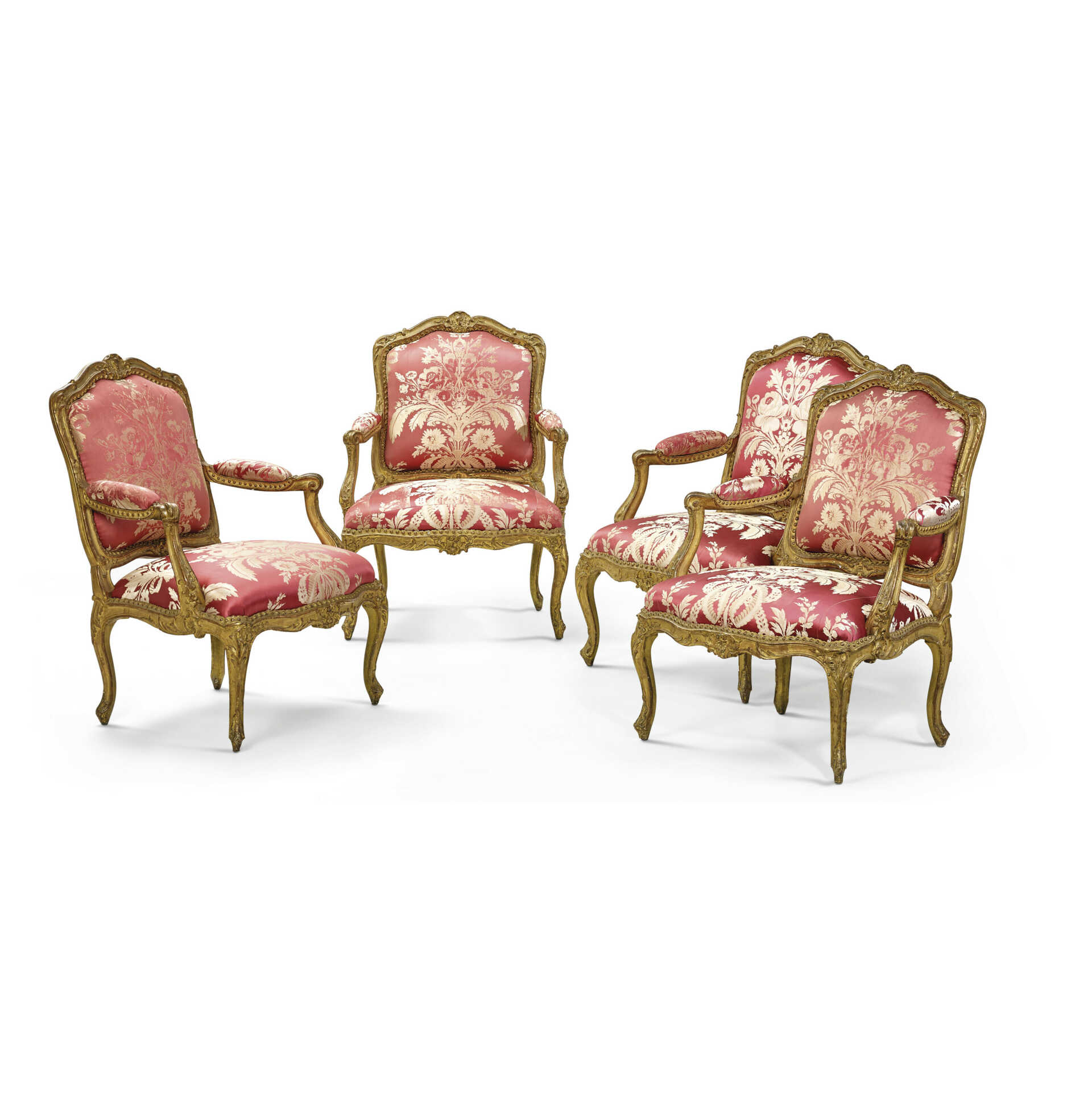 A SET OF FOUR LOUIS XV GILTWOOD FAUTEUILS A CHASSIS