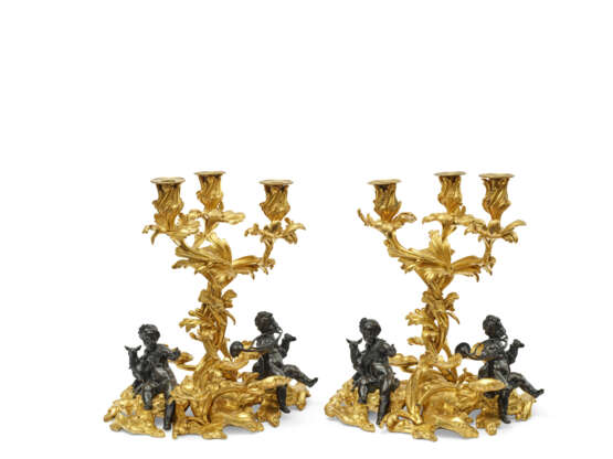 A PAIR OF LOUIS XV PATINATED-BRONZE AND ORMOLU THREE-LIGHT CANDELABRA - фото 1