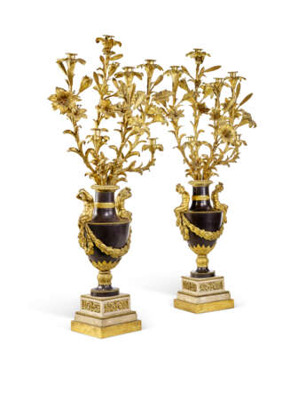 A PAIR OF FRENCH ORMOLU AND PATINATED BRONZE SIX-LIGHT CANDELABRA - фото 1
