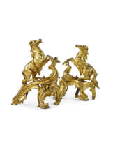 A PAIR OF LOUIS XV ORMOLU CHENETS 'AUX CHEVAUX CABRES'