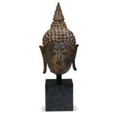 A BRONZE HEAD OF BUDDHA