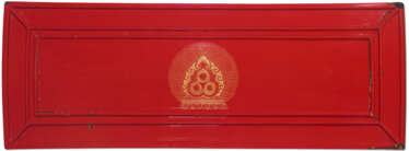 A RARE QIANGJIN ENGRAVED AND GILT-DECORATED RED-LACQUERED WOOD SUTRA COVER