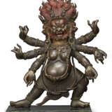 A BRONZE FIGURE OF A WRATHFUL PROTECTOR - фото 1