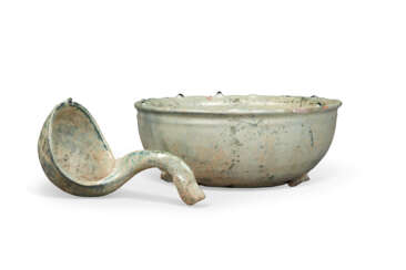 A GREEN-GLAZED POTTERY BOWL AND LADLE