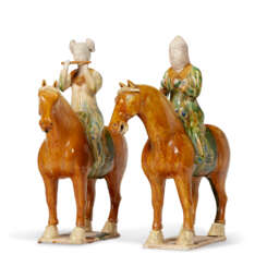 A PAIR OF TANG-STYLE SANCAI-GLAZED POTTERY FIGURES OF EQUESTRIAN MUSICIANS