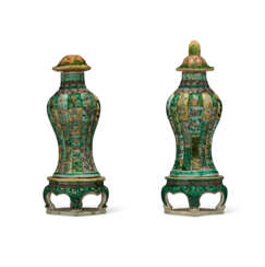 A PAIR OF SMALL FAMILLE VERTE VASES, COVERS AND STANDS