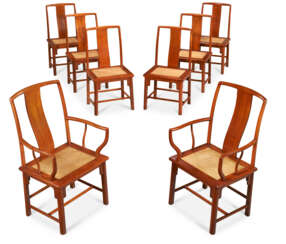 A SET OF SIX TEAK SIDE CHAIRS AND A PAIR OF TEAK ARMCHAIRS