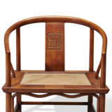 A PAIR OF CHINESE LOW TEAK HORSESHOE-BACK ARMCHAIRS - photo 5