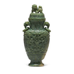 A CARVED SPINACH-GREEN JADE FLATTENED VASE AND COVER