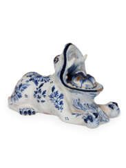 A DUTCH DELFT BLUE AND WHITE BEAST-FORM INKWELL