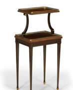 Amarante. AN AUSTRIAN ORMOLU-MOUNTED AND BRASS-INLAID AMARANTH AND EBONY TWO-TIER TABLE DE CAFE