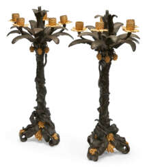 A PAIR OF FRENCH ORMOLU AND PATINATED BRONZE FIVE-LIGHT CANDELABRA