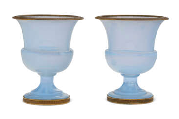 A PAIR OF ORMOLU-MOUNTED PALE-BLUE TRANSLUCENT OPALINE GLASS CAMPANA VASES