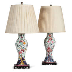 A PAIR OF CHINESE EXPORT PORCELAIN FAMILLE ROSE VASES MOUNTED AS LAMPS