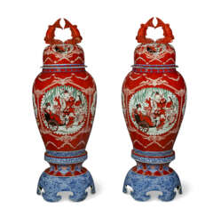 A PAIR OF MASSIVE JAPANESE EXPORT PORCELAIN IMARI VASES, COVERS AND STANDS