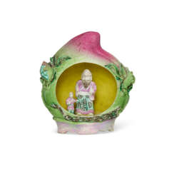 A CHINESE EXPORT PORCELAIN FAMILLE ROSE MODEL OF SHOULAO IN A PEACH