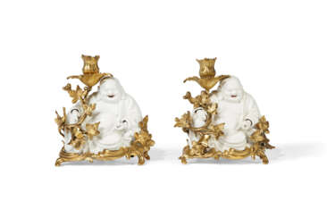 A PAIR OF FRENCH ORMOLU-MOUNTED CHINESE BLANC-DE-CHINE PORCELAIN CANDLESTICKS