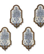 Faience. FOUR BRONZE-MOUNTED DUTCH DELFT BLUE AND WHITE TILE WALL LIGHTS