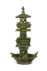 A CHINESE THREE-TIERED GREEN-GLAZED POTTERY WATCH TOWER