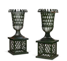 A PAIR OF MONUMENTAL STEEL GARDEN PLANTERS