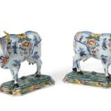 A PAIR OF DUTCH DELFT POLYCHROME MODELS OF STANDING COWS - photo 1