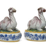 A PAIR OF ASSOCIATED DUTCH DELFT POLYCHROME CAMEL-FORM BUTTER DISHES AND COVERS - photo 1