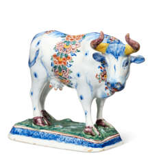 A DUTCH DELFT POLYCHROME MODEL OF A STANDING COW
