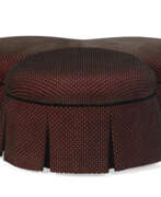 Ottoman. A CONTEMPORARY UPHOLSTERED POUF
