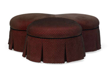 A CONTEMPORARY UPHOLSTERED POUF