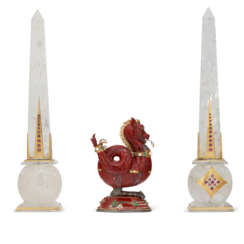 A PAIR OF AMERICAN GOLD AND RUBY-MOUNTED ROCK CRYSTAL OBELISKS AND A SILVER, GOLD, EMERALD, AND PEARL-MOUNTED RED JASPER DRAGON-FORM BOX