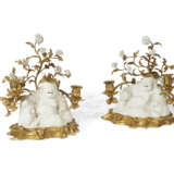 A PAIR OF FRENCH ORMOLU-MOUNTED AND PORCELAIN TWIN-LIGHT CANDELABRA - photo 1